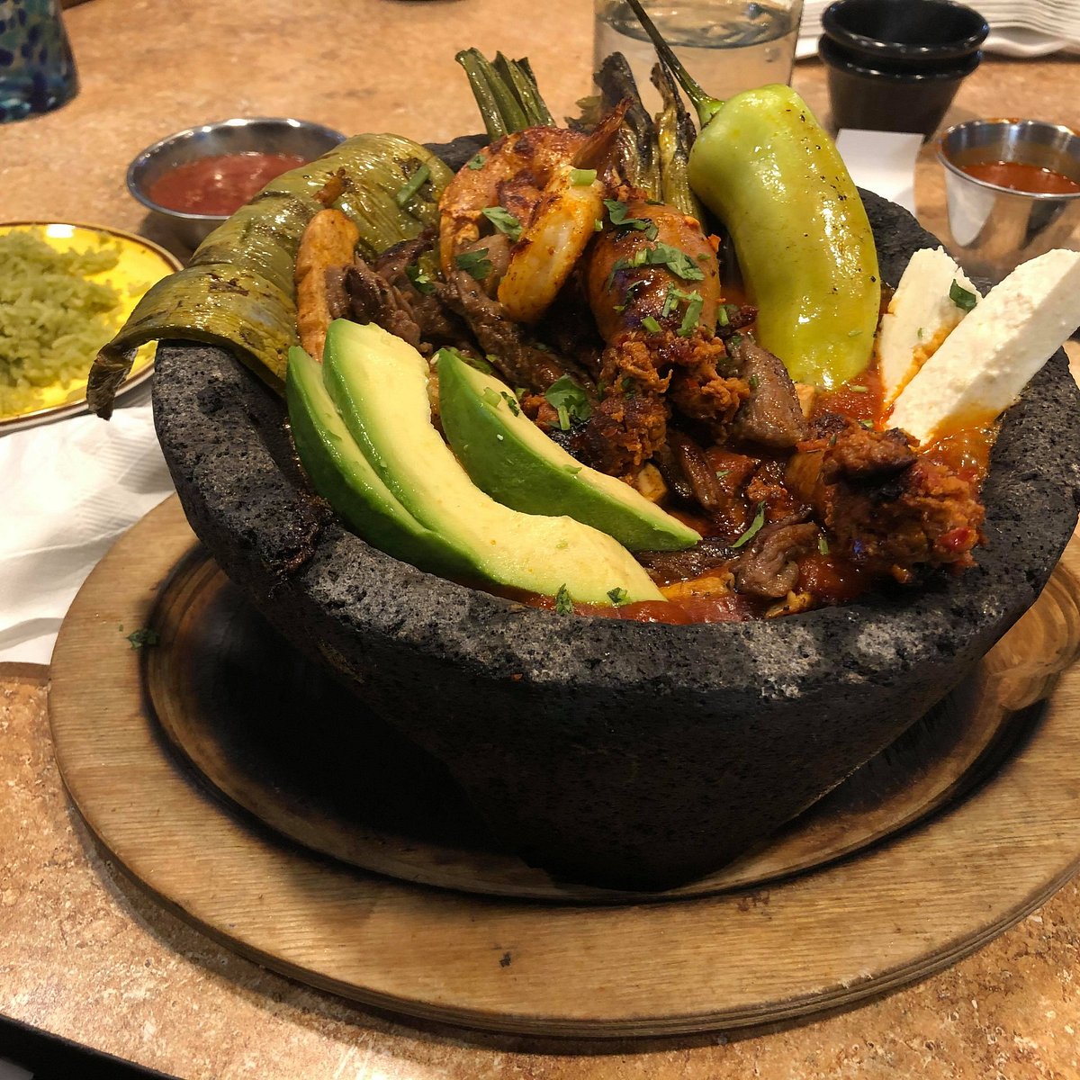La Media Luna signature dishes Fajita QuesadillaEnchiladas HabaneroPastel Azteca